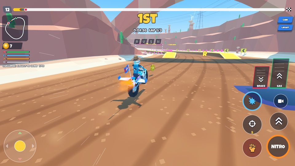 A rider flying off a dirt ramp