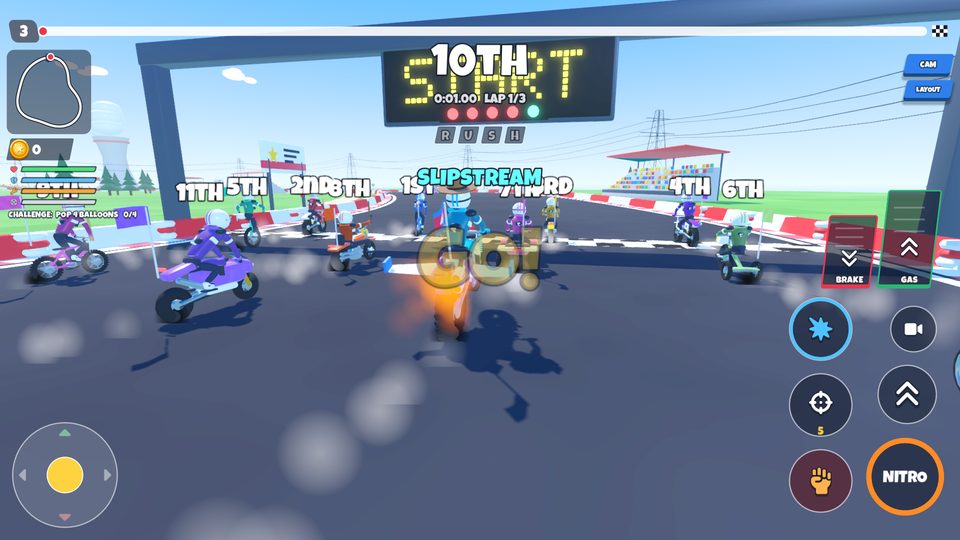 A pack of riders racing side by side
